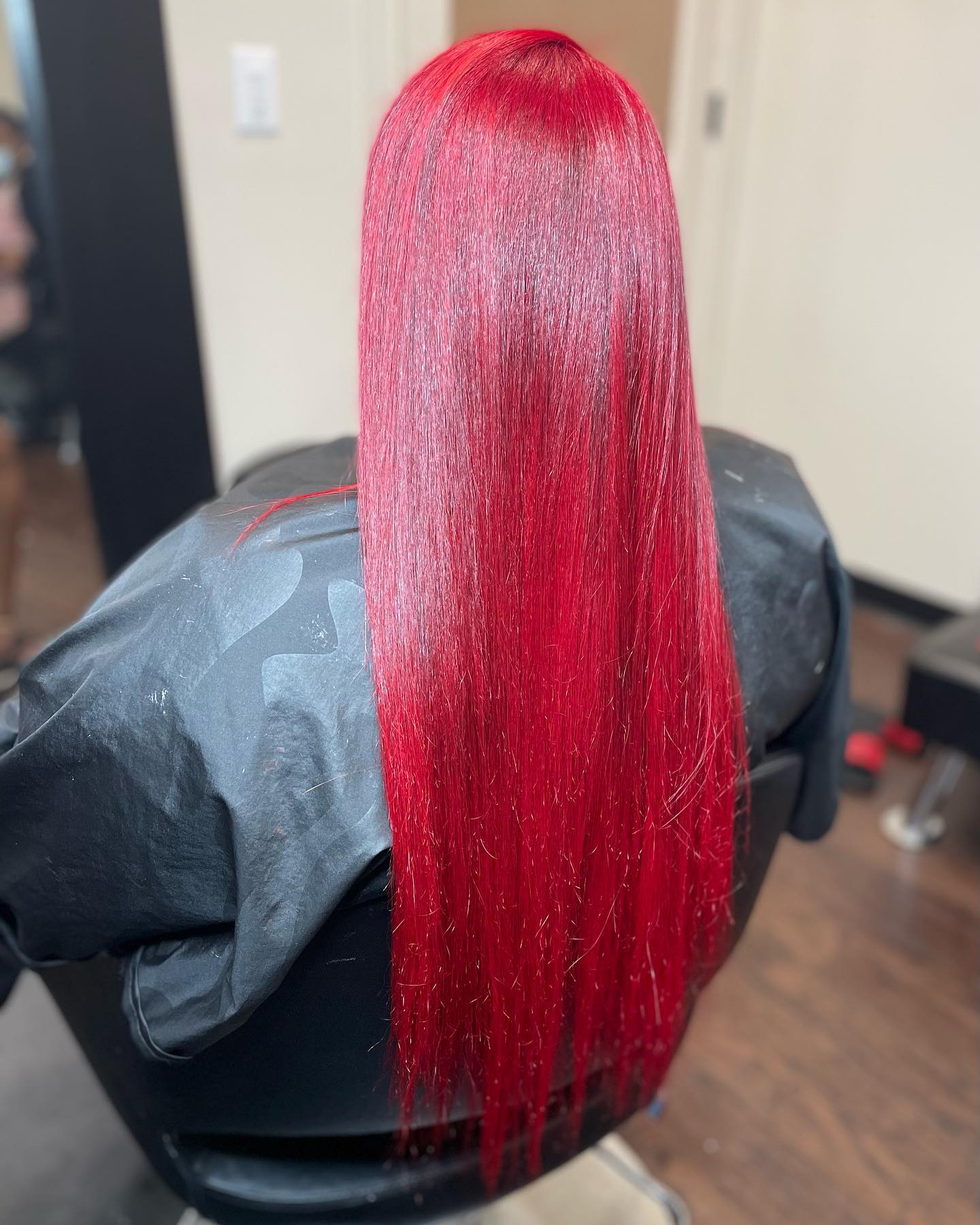 Vibrant red color and length styled at Gifted Hands Beauty Bar