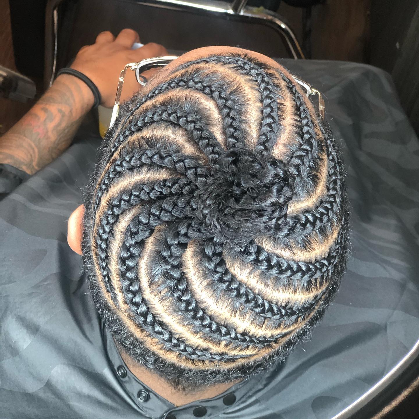 Artistic swirl cornrow pattern by Gifted Hands Beauty Bar